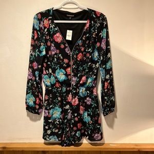 Brand new never wore long sleeve floral romper with pockets.